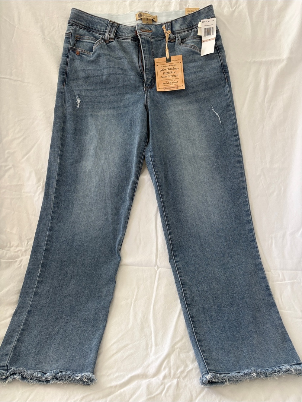 Democracy Light Blue Wide-Leg Flare Jeans with Frayed Hem.